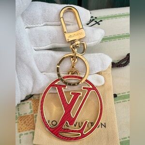Louis Vuitton Gold-Tone Keychain with Red LV Circle Charm